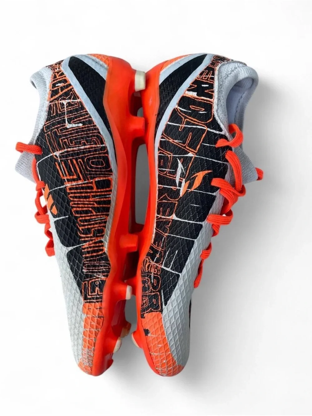 adidas Gray and Orange Soccer Cleats with Black Stripes